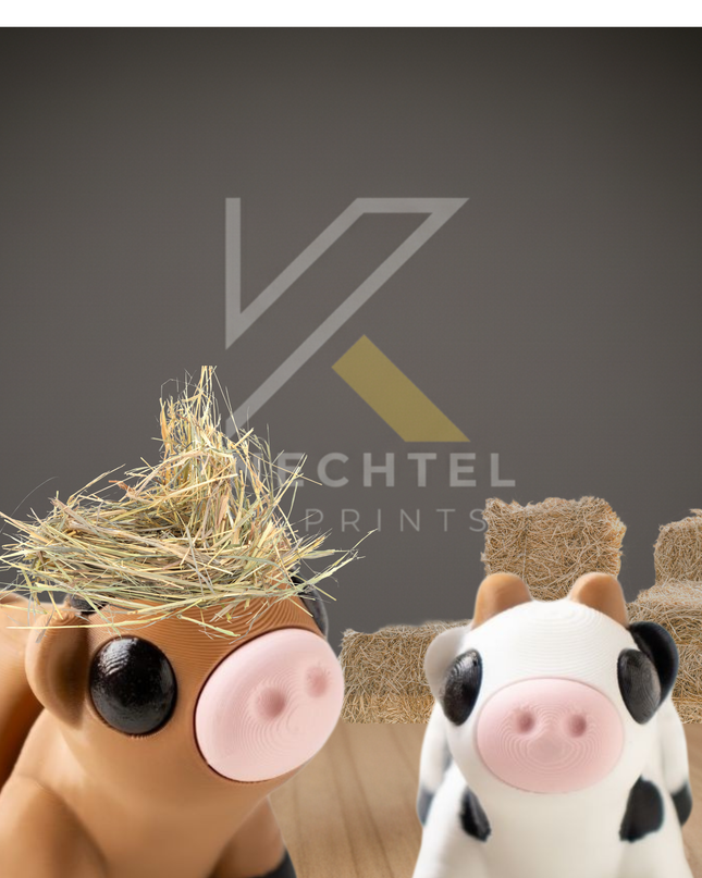 Two small articulated cow figures sit on a wooden surface in front of hay bales. The brown cow wears a tuft of straw on its head while the white cow with black spots looks on. The background features a soft gray wall with the Knechtel 3D Prints logo faintly visible, giving the scene a cozy barnyard feel.