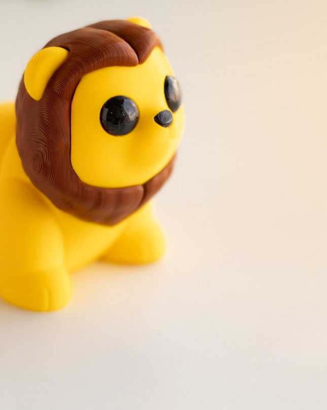 Toy lion figure on a light background