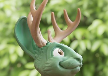 Green 3d printed jacklaope - a folklore forest creature with deer antlers against a blurred green background