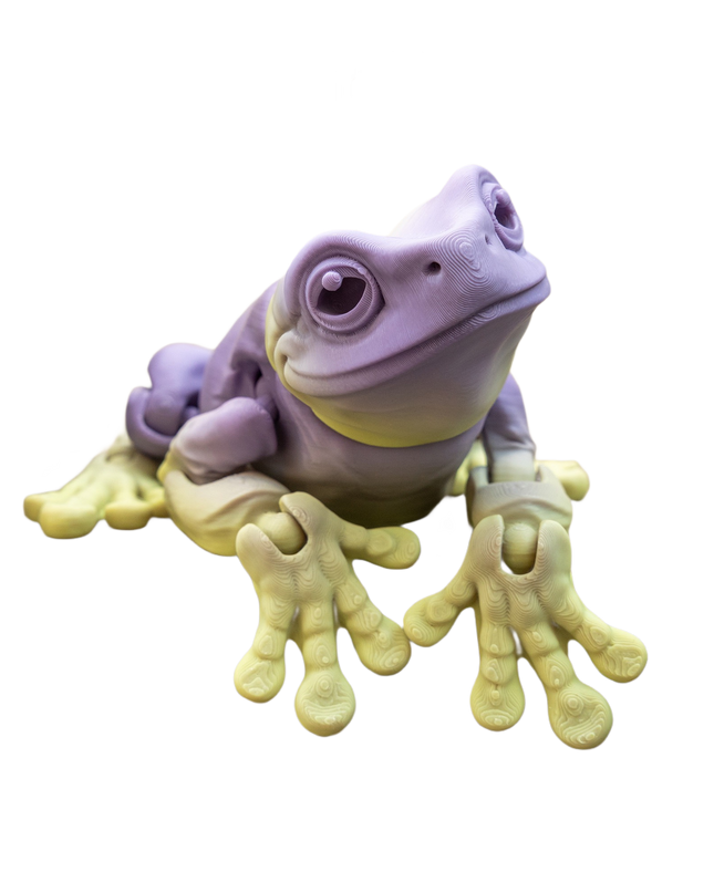 Purple frog figurine on a white background