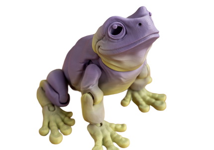 Purple and yellow frog figurine on a white background