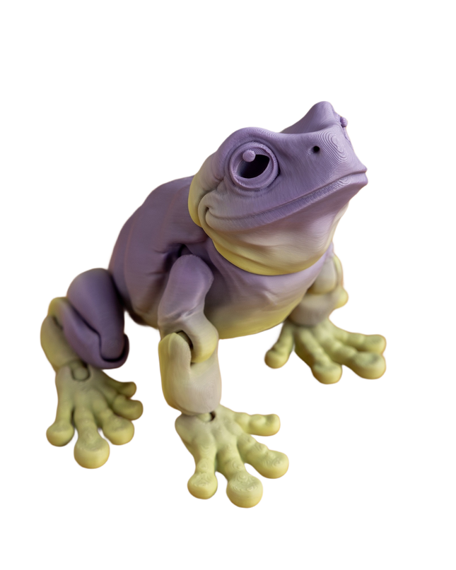 Purple and yellow frog figurine on a white background