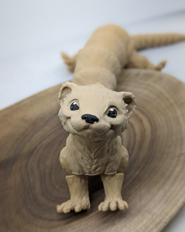 a close up of a 3d printed ferret toy standing on a wooden base with a white background