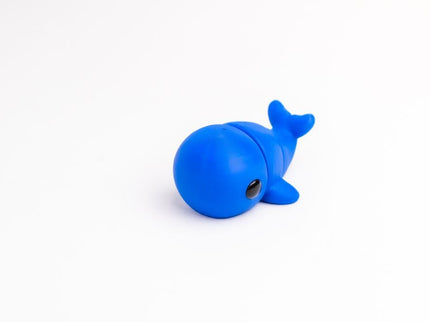 Blue articulated whale toy on a white background