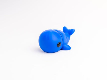 Blue whale toy on a white background